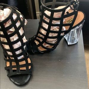 Lace up clear bottom heel sandals by Qupid